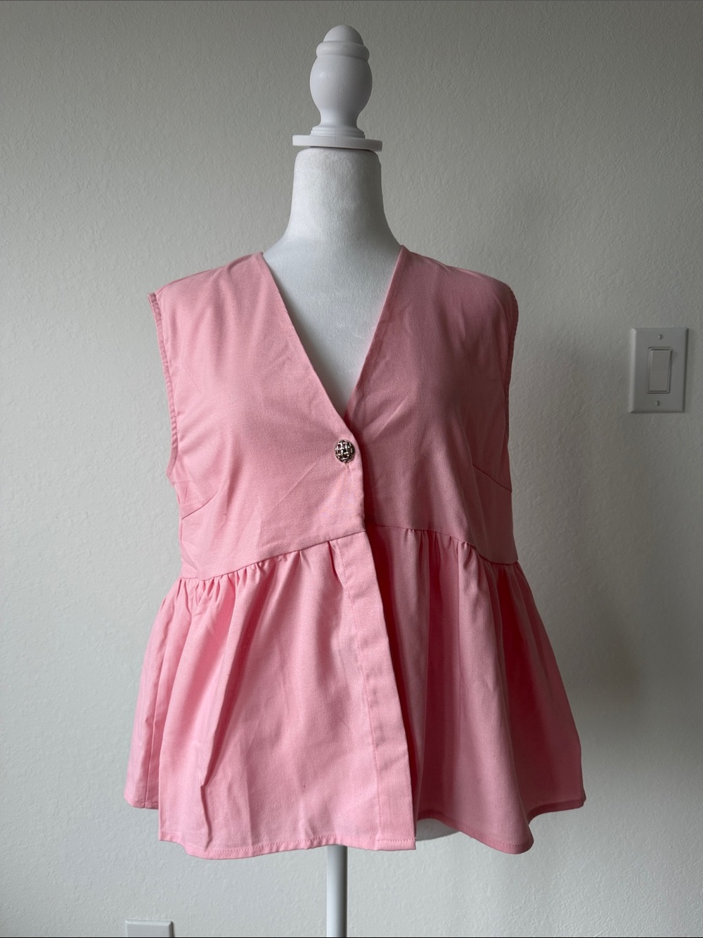 Sleeveless Pink Peplum Button-Front Top